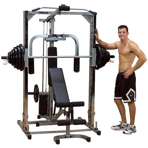 man standing next to home gym