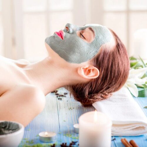 woman with facial mask relaxing